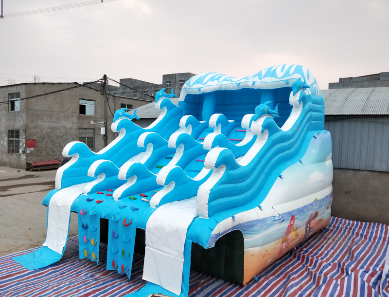 surf-themed inflatable water slide